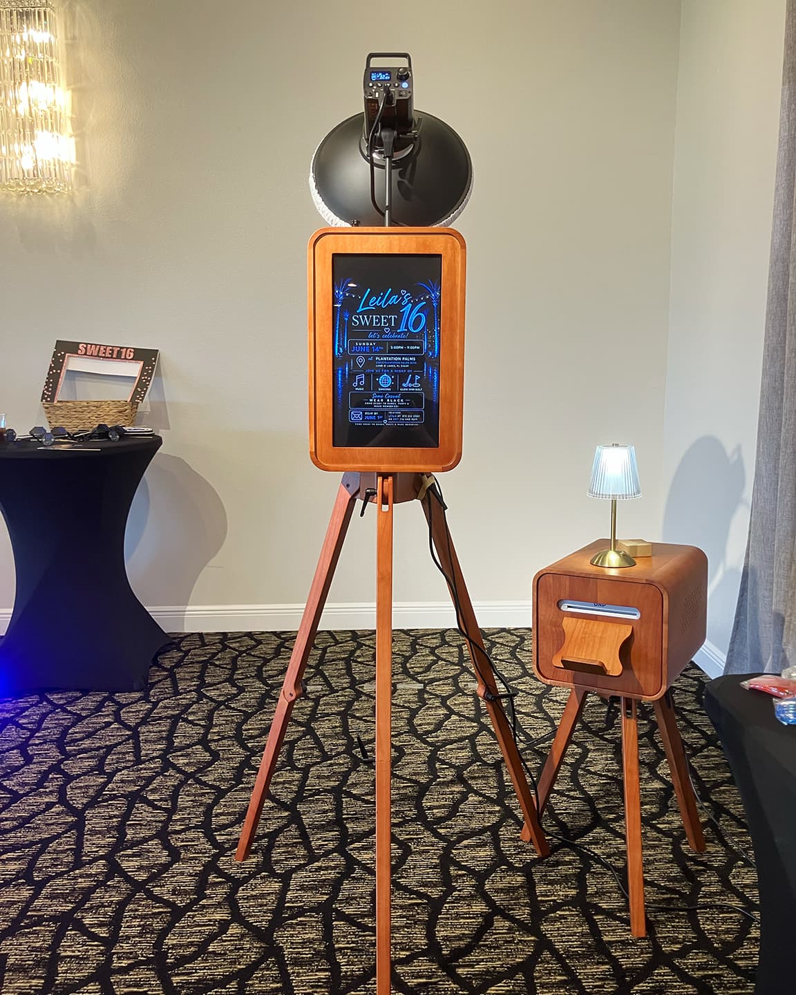 Firstlight photobooth setup with a sweet sixteen screen display