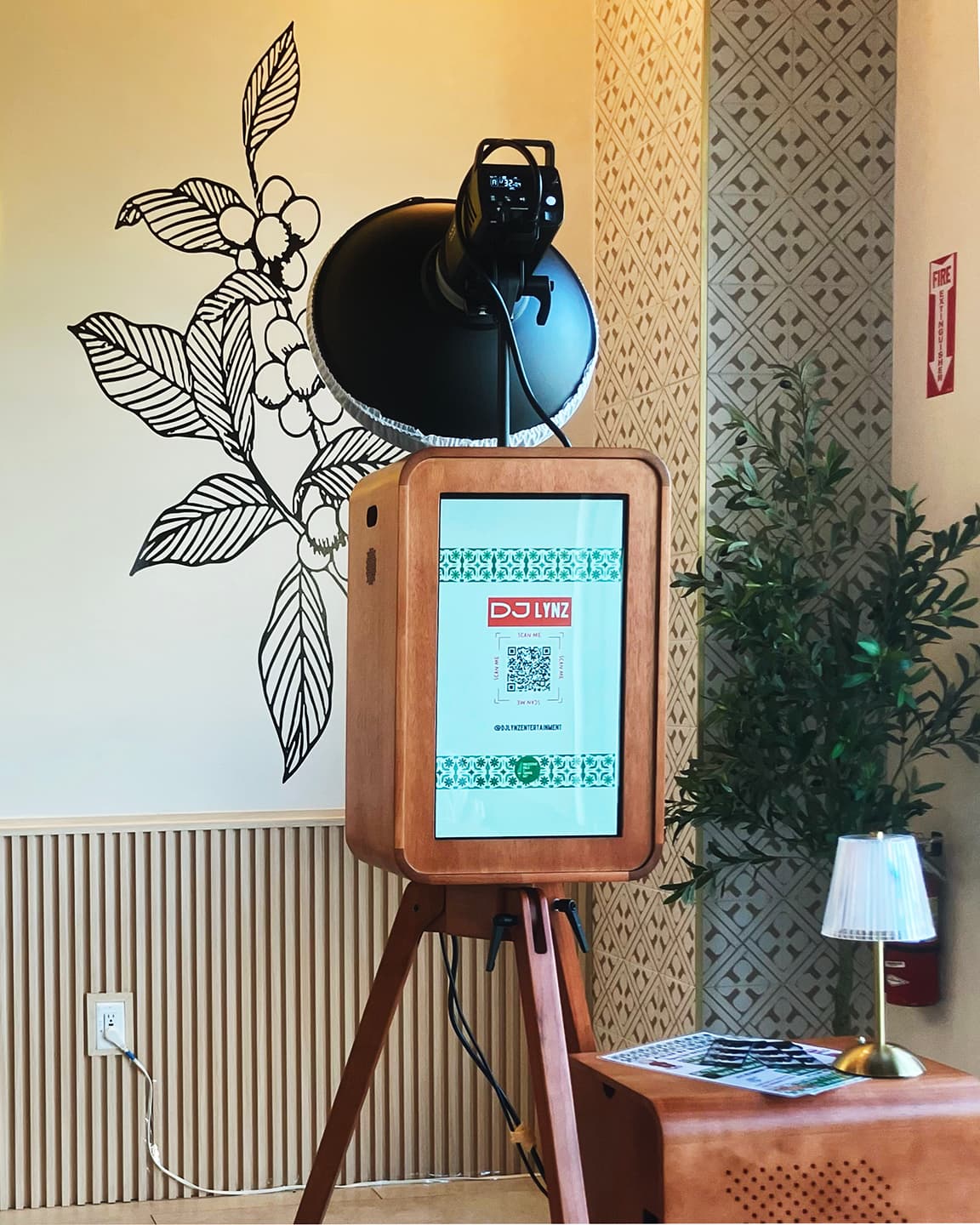Tampa photo booth rental with custom branded screen display and professional beauty dish lighting